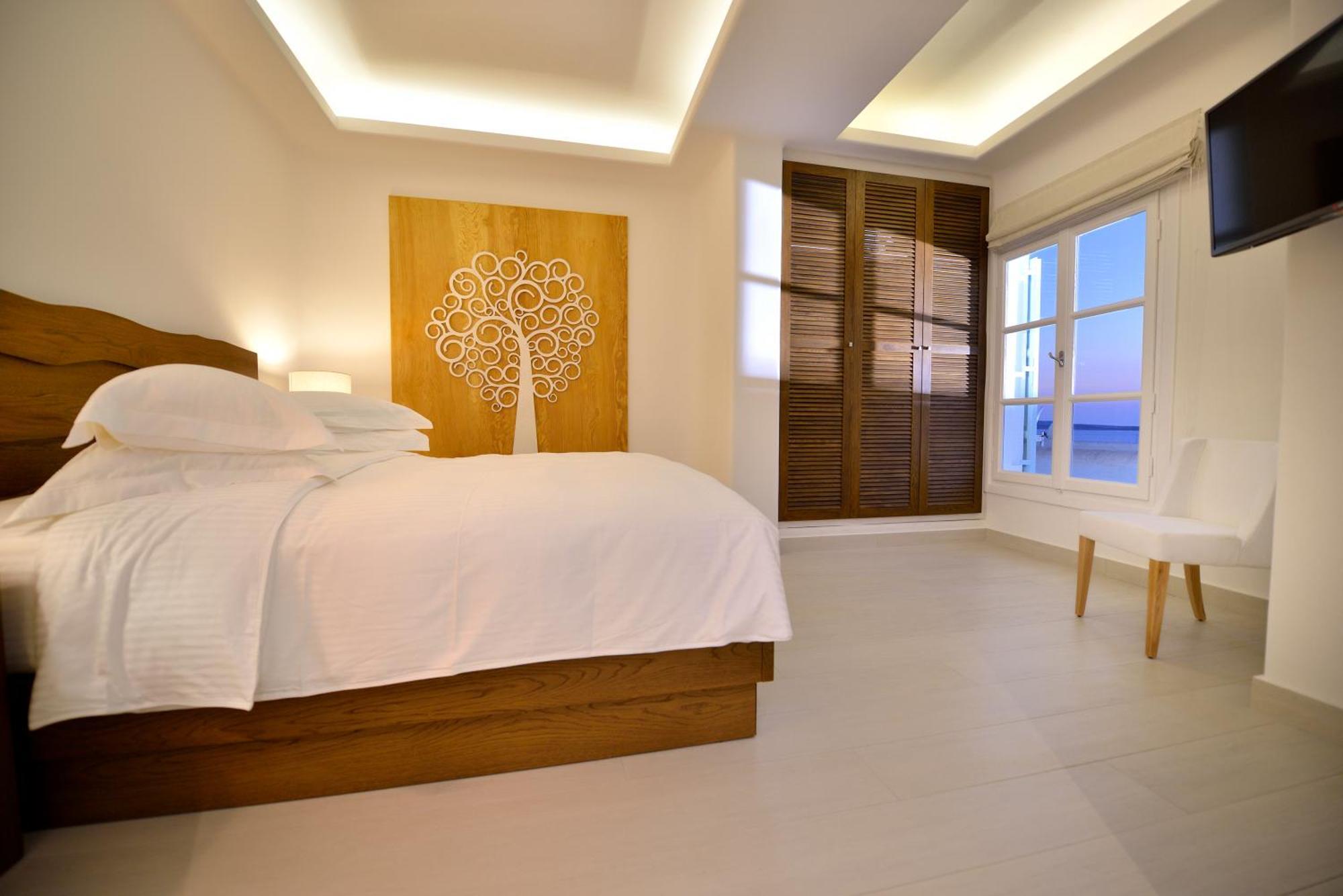 Saint John Hotel Villas & Spa Agios Ioannis Diakoftis Eksteriør bilde A bedroom at the hotel